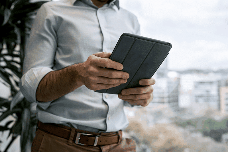 A man holding a tablet